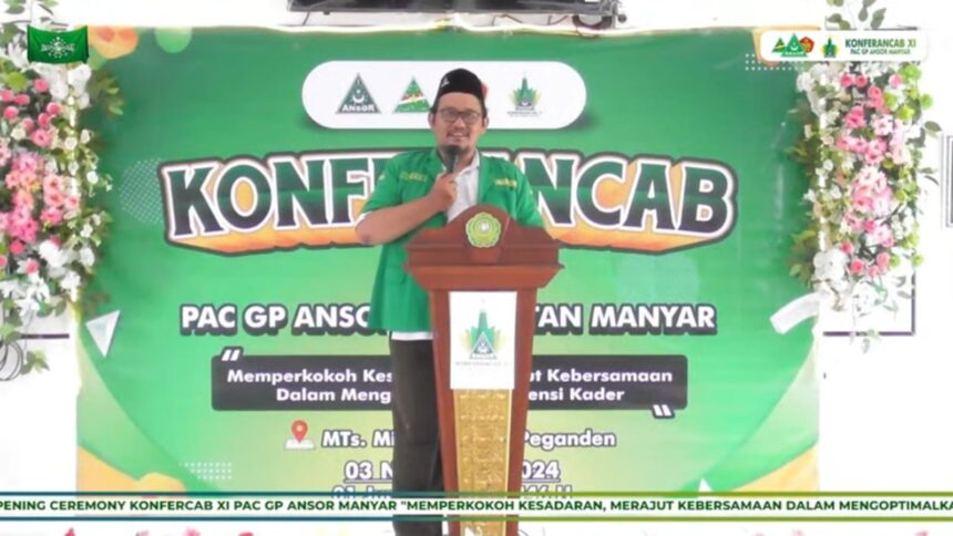 Ketua PAC GP Ansor Manyar 2022 - 2024, sahabat Vicky Firmansyah saat menyampaikan sambutan pembukaan Konferancab XI PAC GP Ansor Manyar, Ahad (3/11/2024). Foto: YouTube PAC GP Ansor Manyar/NUGres