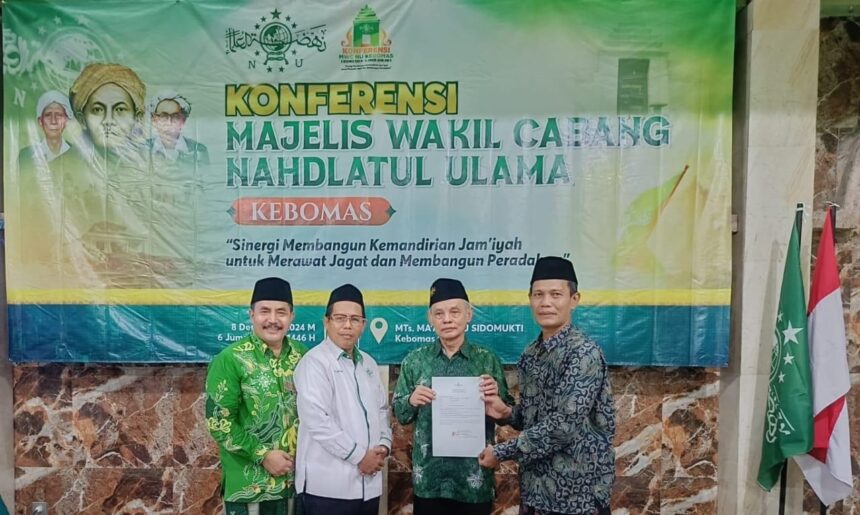 Konferensi Majelis Wakil Cabang Nahdlatul Ulama (MWCNU) Kebomas berlangsung pada Ahad (8/12/2024) menetapkan secara aklamasi duet Rais Syuriyah KH Harun Azhar dan KH M. Muchsin Munhamir (Gus Hamir) untuk masa khidmat 2024 - 2029. Foto: dok MWCNU Kebomas/NUGres