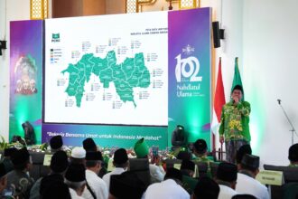 Ketua Tanfidziyah Pengurus Cabang Nahdlatul Ulama (PCNU) Gresik, Dr KH Mulyadi MM., saat menyampaikan sambutan di momen Peringatan Hari Lahir (Harlah) ke-102 NU, Sabtu (22/2/2025). Foto: Jalil/NUGres