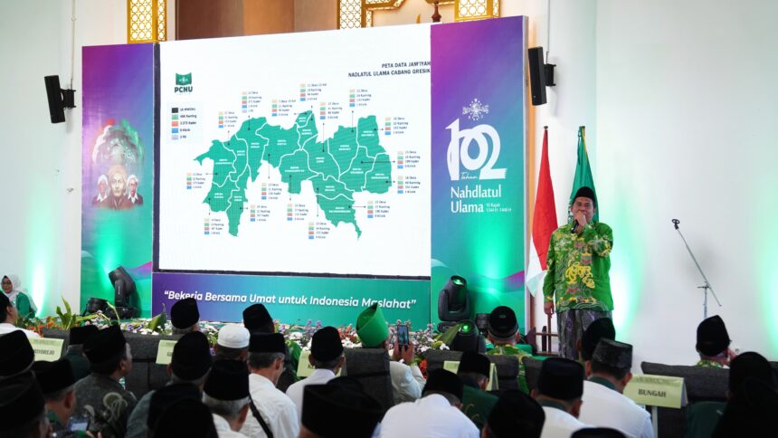 Ketua Tanfidziyah Pengurus Cabang Nahdlatul Ulama (PCNU) Gresik, Dr KH Mulyadi MM., saat menyampaikan sambutan di momen Peringatan Hari Lahir (Harlah) ke-102 NU, Sabtu (22/2/2025). Foto: Jalil/NUGres